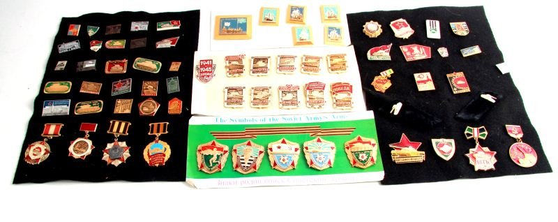 USSR RED ARMY TANK AND MILITARY PINS COLD WAR: Fifty-eight Cold War-era Soviet, USSR, and Red Army tank pins, a display with five “Symbols of the Soviet Army’s Arms” and a Russian maritime explorers pins. Overall in very good to excellent co