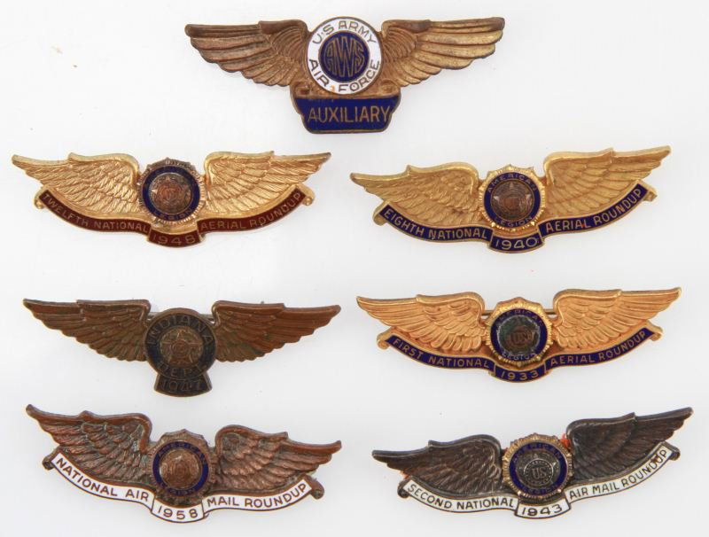 6 NATIONAL AIR MAIL ROUNDUP WINGS 1933 TO 1958: Of the six sets one is sterling, each is 1.75 inches with 45 degree opening pins, the 1933 is a nicely toned gold fill, the 1940 is gold fill, 1943 is sterling, 1947 is bronze, 1948 is gold fill, 1959