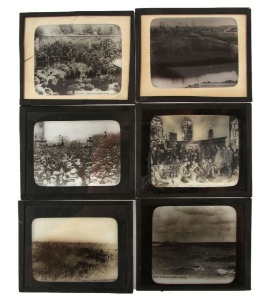 WWI LANTERN SLIDE PLATES US SIGNAL CORPS: Six Slides of pictures from WWI. Slides include what looks to be a town meeting; Another of troops marching through the streets; military trucks driving down a dirt road; some guns ready in a trench; 