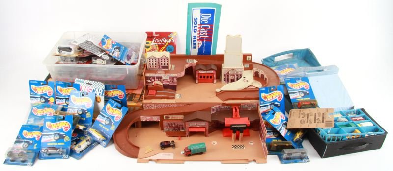 LARGE GROUP OF HOTWHEELS MATCHBOX LESNEY: Group includes Hot Wheels Wipe Out Board Game, Hot Wheels City, Two car Carrying cases, and well over 50 cars. About half are new in box. Overall in very good condition.