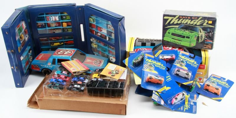 DAYS OF THUNDER MIXED MATCHBOX AND STOCK CARS: Collector's lot of mixed Matchbox and Stock cars. Lot includes: Days of Thunder 1:24 Chevy Lumina Model Kit (new in box), four antique Citgo mini model kits, 16 Days of Thunder die-cast metal cars (ne