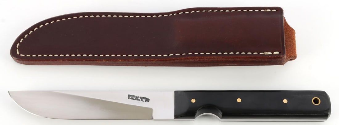RANDALL MODEL 10 SALT FISHERMAN KNIFE: Stainless steel 5-inch blade with Micarta grip. Includes leather sheath. This lot has a reserve.