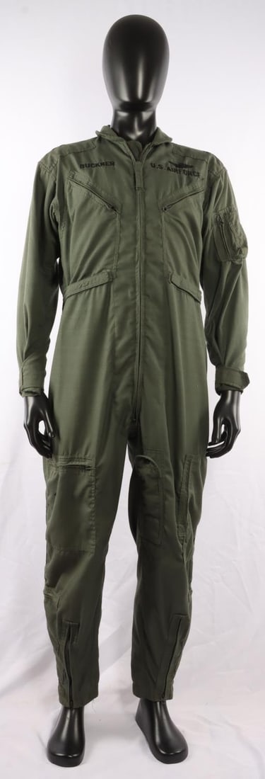 MAJOR GENERAL JOHN BUCKNER AIR FORCE FLIGHTSUIT: Flight suit attributed to Major General John Hugh Buckner. Two (2) stars sewn into shoulders, command eagle on chest, 'Buckner' sewn on chest. Size 44. Very good, original condition.