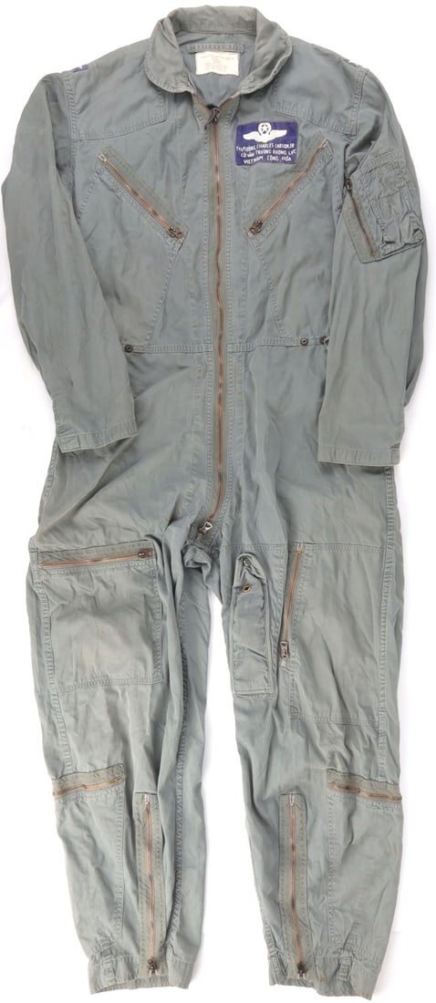 VIETNAM WAR FLIGHT SUIT FOR LT. GEN CHARLES CARSON: A particularly rare flight suit from the Vietnam War, this one belonging to Lieutenant General Charles William Carson, Jr. includes writing in both English and Vietnamese .Size regular. Very good, ori