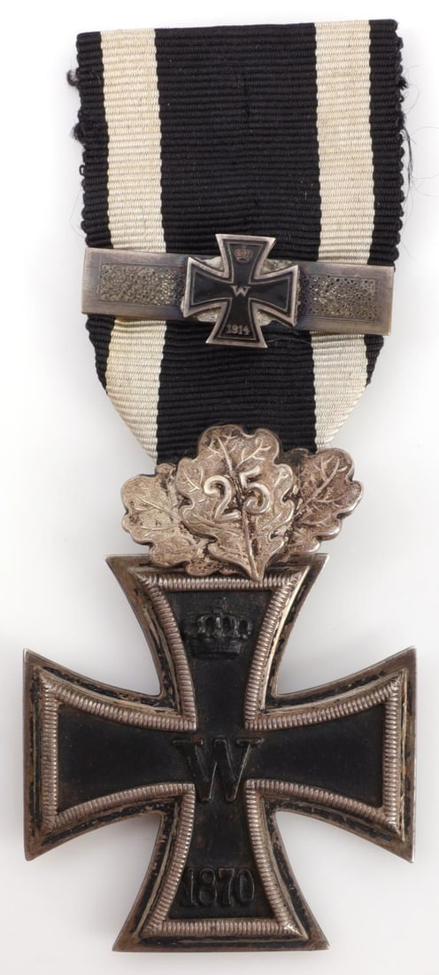 1870 IRON CROSS 2ND CLASS JUBILEE SPANGE 1914 BAR: Imperial German 1870 Iron Cross, 2nd Class, with 25 year jubilee spange and 1914 ribbon bar. Very good condition. Age toning, patination. Iron core has slight movement, play inside the silver frame.