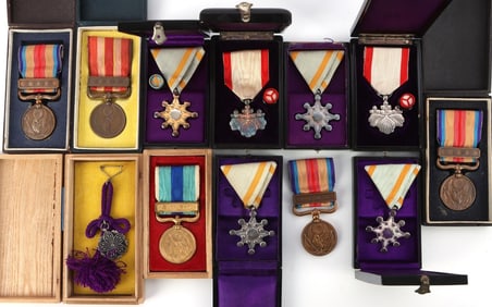 LOT OF 12 ASSORTED & BOXED WWII JAPANESE MEDALS