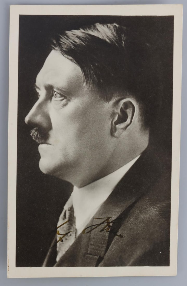 WWII GERMAN REICH ADOLF HITLER SIGNED POSTCARD: Adolf Hitler signed postcard depicts Hitler in profile. Deemed authentic according to terms. Very good, original condition.