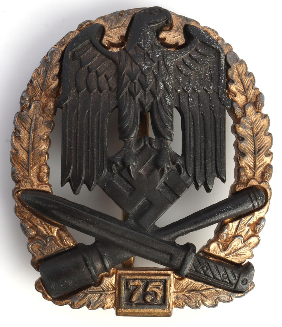 WWII GERMAN GENERAL ASSAULT 75 BADGE FEIX & SOHNE: Third Reich General Assault Grade IV (75 engagements) badge. Two-piece solid-struck construction with blackened zinc eagle and gilt wreath. Reverse shows four domed rivets and maker's mark "JFS." Vert
