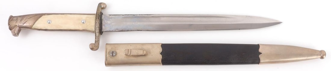 WWII GERMAN DIPLOMATIC BAYONET ALCOSO MAKE: Steel blade with nickel plating. Silvered crossguard and pommel with bone grip. 14.25 inches. Rare as only a few of these were made towards the end of the war and never distributed. This lot has a res