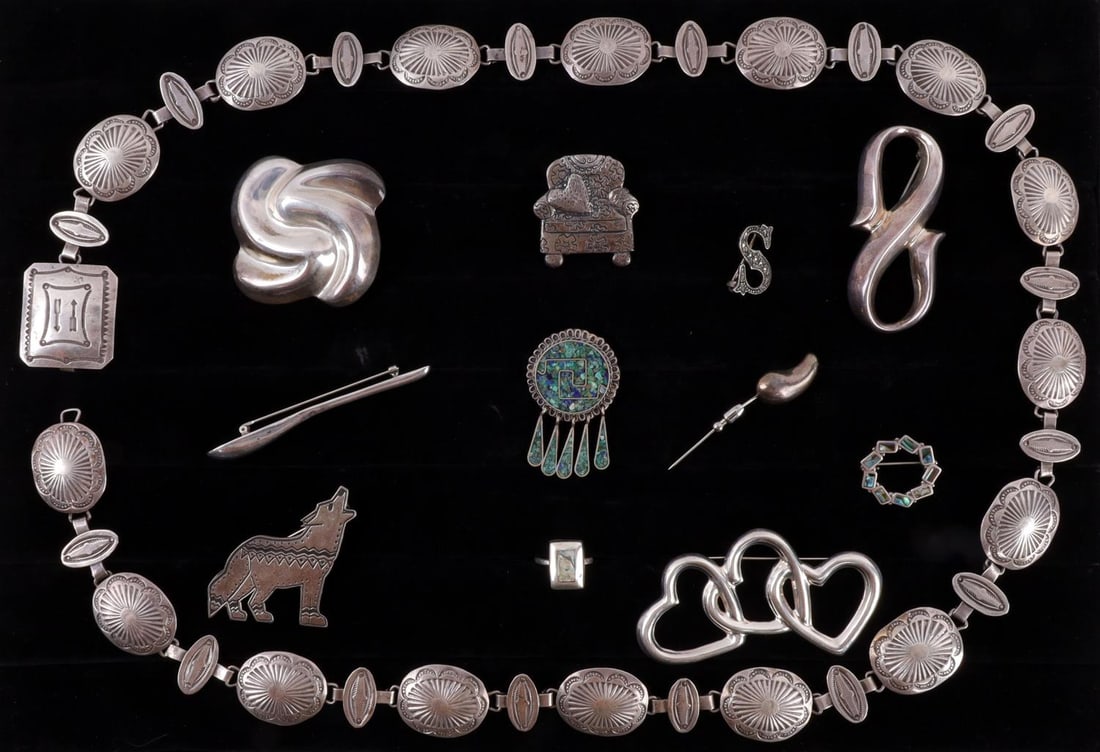ASSORTED STERLING SILVER PIN BELT RING LOT: Assorted lot of sterling silver pins, ring, and belt. 1) Native American style sterling silver belt, 33 inches. 2) 10 pins, including 3 Native American style pins. Sizes range 3/4 to 3 inches. 3) 1 st