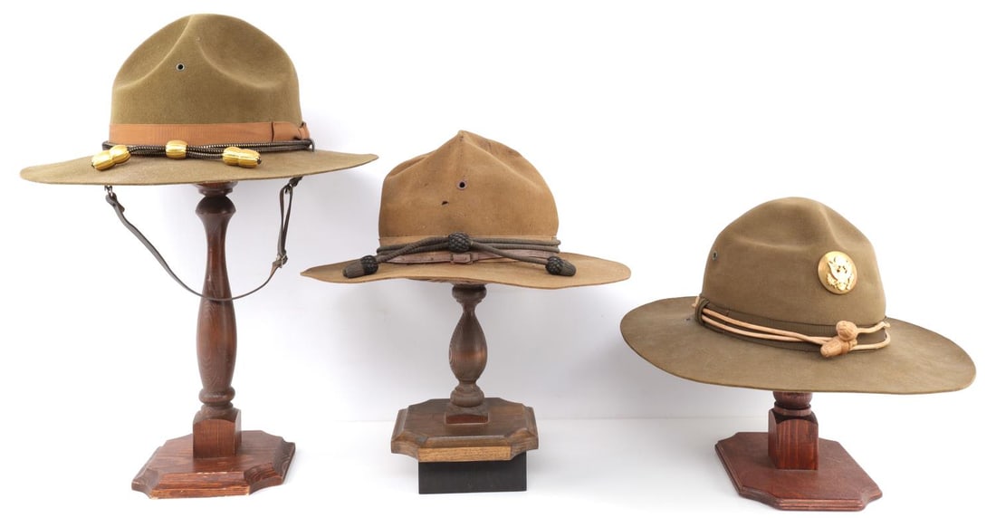 LOT OF 3 WWI & WWII US ARMY CAMPAIGN HATS W/ CORDS: Lot of THREE (3). Includes WWII Quartermaster hat with cord, WWI-era hat with company tag and some mothing. Also includes post-WWII hat with "7 5/8" size tag on interior-marked "Campaign" on sweatband