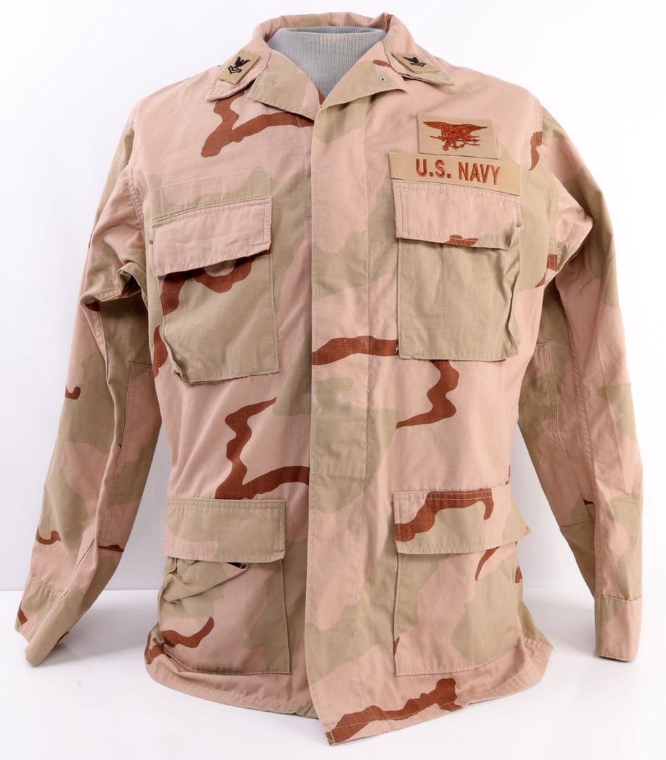 UNITED STATES NAVY SEAL JACKET AFGHAN TERROR: United States Navy Seal jacket from the Afghanistan theater of the War on Terror. US Navy and Navy Seal patches on front, collar tab indicates rank of Petty Officer Second Class. Staining on front. St