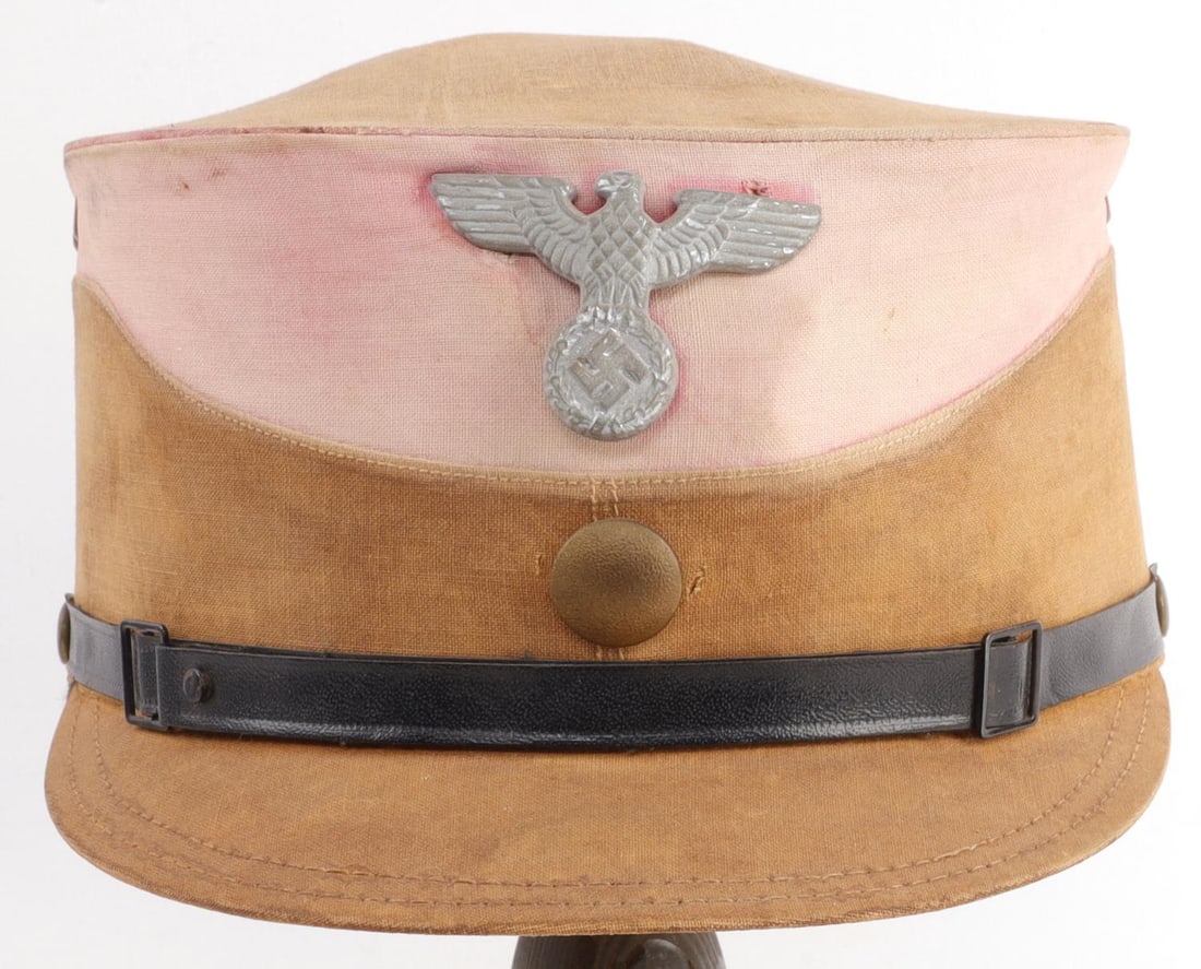 WWII GERMAN THIRD REICH NSDAP SA KEPI: Tan cotton kepi with faded band. Very good condition with usage war. Interior diameter approximately 7 inches. Previously from Valkyrie Historical Auctions.