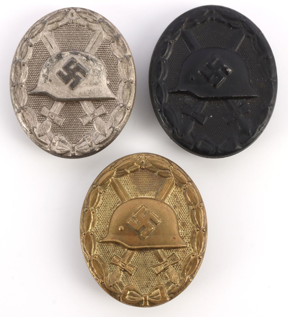 WWII GERMAN SILVER GOLD BRONZE WOUND BADGE LOT: Each in very good, original condition. Two (2) are makers marked. All have tight, wobble-free pins.