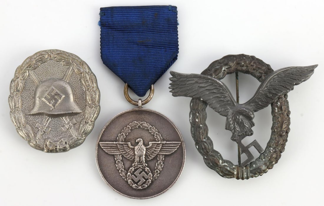 LOT OF 3 WWII GERMAN BADGES AND POLICE MEDAL: Lot of THREE (3) features a Pilot Observer badge, wound badge, and an 8-year police medal. Post-war pieces.