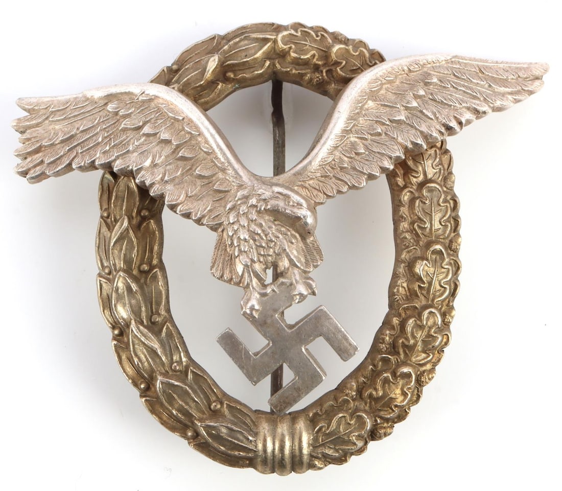 WWII GERMAN THIRD REICH LUFTWAFFE PILOT BADGE: Junker maker stamped reverse, firm wobble free pin to a flat end, exceptional detail, very good original condition. This lot has a reserve.