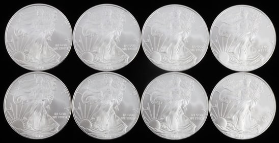 LOT OF 8 SILVER 1 OZT BU AMERICAN EAGLE COINS 2010