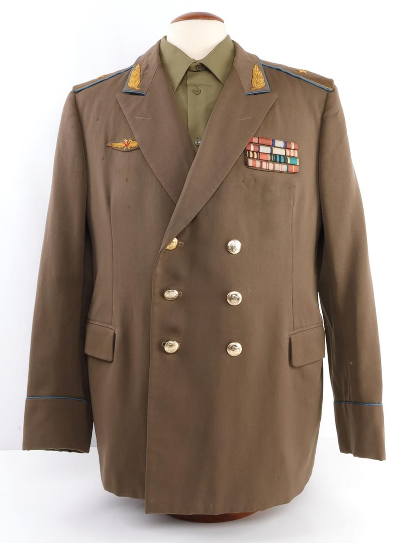SOVIET UNION AIR FORCE GENERALS JACKET SHIRT: General's jacket from the Soviet Air Force. Olive green. Eight (8) buttons, one replaced later and of a slightly different hue. Four-tier ribbon bar. Shoulder boards and collar embroidery are in gold 