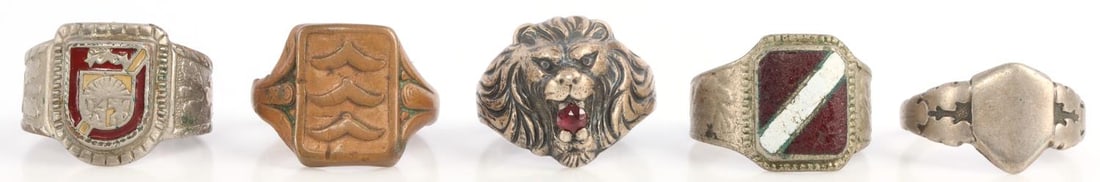 LOT OF 5 WORLD WAR RINGS LION HEAD LUFTWAFFE: Lot of FIVE (5). Lion head with garnet, Latvian rings, and Luftwaffe. Very good condition. Sizes 9 - 11.