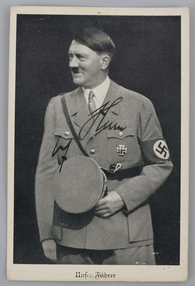 WWII GERMAN THIRD REICH ADOLF HITLER SIGNATURE: Postcard featuring Adolf Hitler. Signed by Hitler with the 'lightning bolt' signature. Very good, original condition.