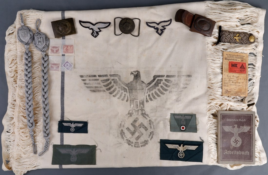 20 PC LOT WWII GERMAN THIRD REICH COLLECTION: TWENTY (20) piece lot collection of Third Reich artifacts. Includes Luftwaffe belt buckle on leather tab (reverse marked "RS&S" under catch), SA enlisted belt buckle, SS officer's belt buckle (reverse