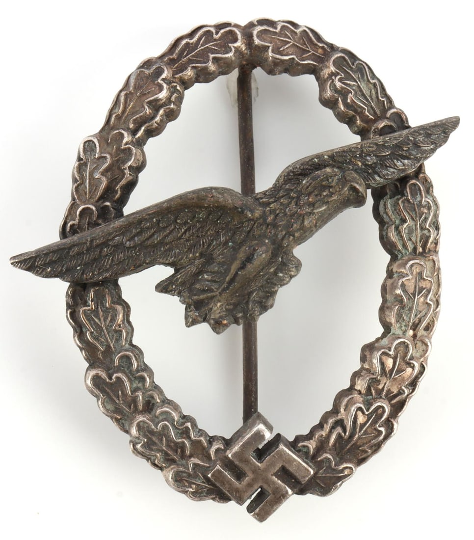 WWII GERMAN THIRD REICH GLIDER BADGE: Osang maker stamped eagle reverse. Tight pin to a point, free of wobble. Exceptional detail. Very good, original condition. This lot has a reserve.