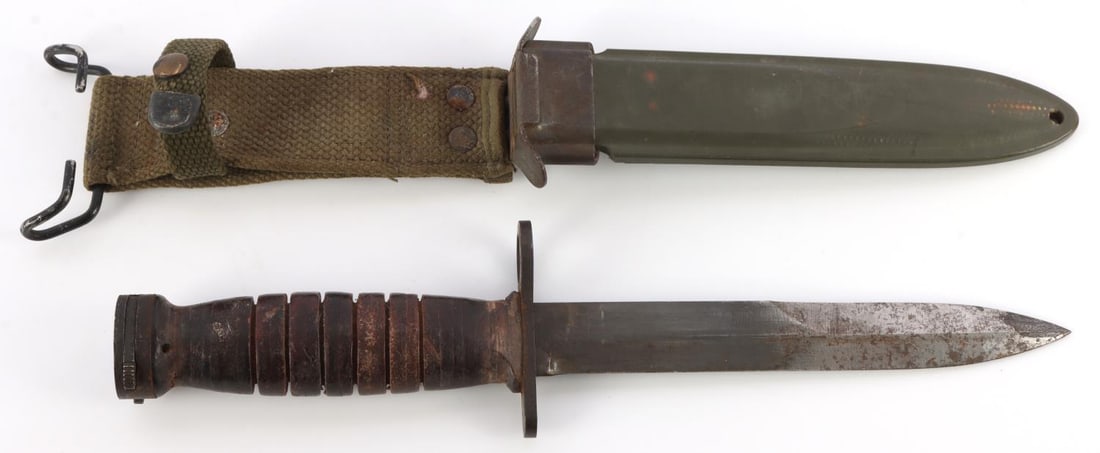 WWII US UTICA M4 KNIFE BAYONET WITH M8 SCABBARD: US M4 knife bayonet with B.M. Co. M8 scabbard. Bayonet crosspiece has US ordnance mark and "U.S. M4 Utica." 6.75-inch blade. Very good overall condition.