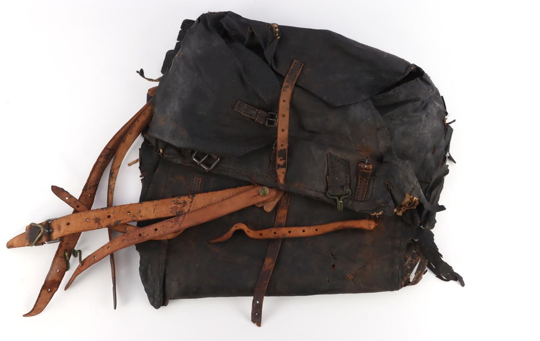 US CIVIL WAR UNION ARMY 1864 BACKPACK: Dark blue back pack for the Union Army, dated 1864. Mothing is extensive and one side of back is exposed. Very good, original condition. Authentic original. 19 X 11 inches.