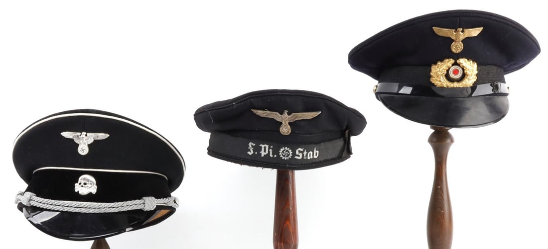 LOT OF 3 WWII GERMAN THIRD REICH ASSORTED VISORS: Lot of THREE (3). Includes: 1) WWII German Veterans Organization Visor Cap. No fluorescing. Cotton construction. 7 1/4 inch diameter. 2) WWII German Kriegsmarine Visor Cap. Marked inside, "Otto Hofer.