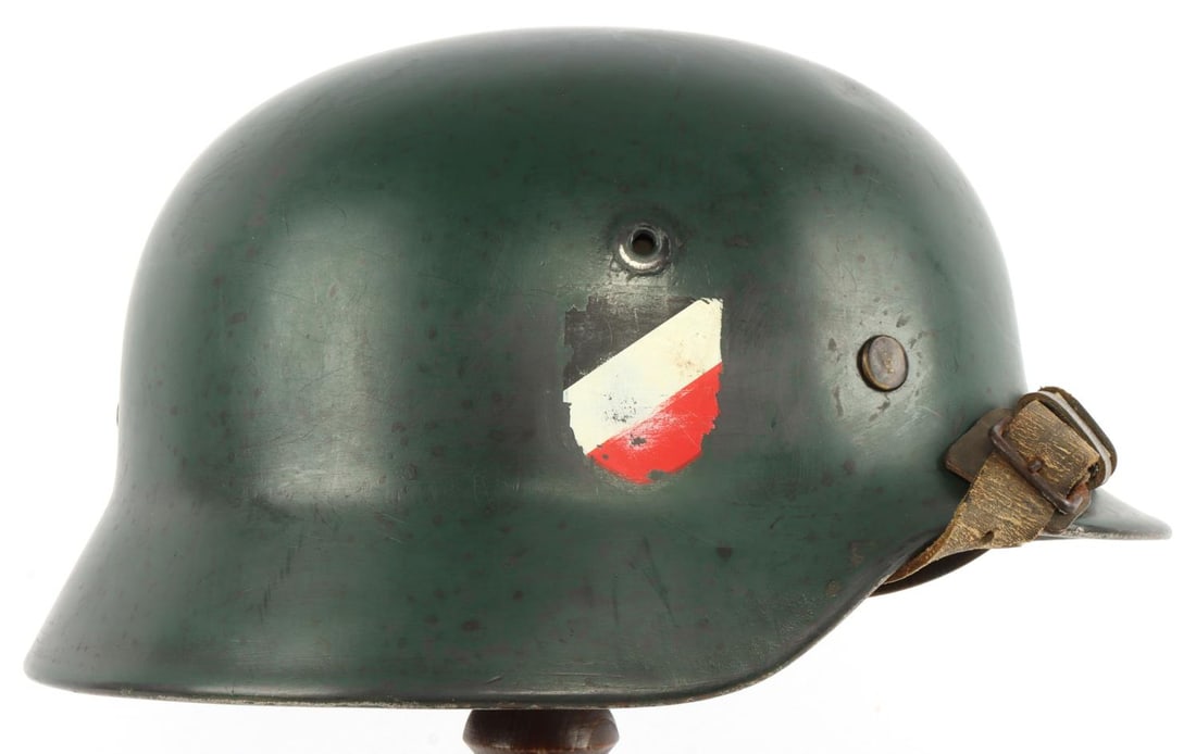 WWII GERMAN THIRD REICH M35 HEER HELMET: Repainted helmet. Marked Q64 and 350. Interior diameter Measures 8.5 inches. Very good condition.