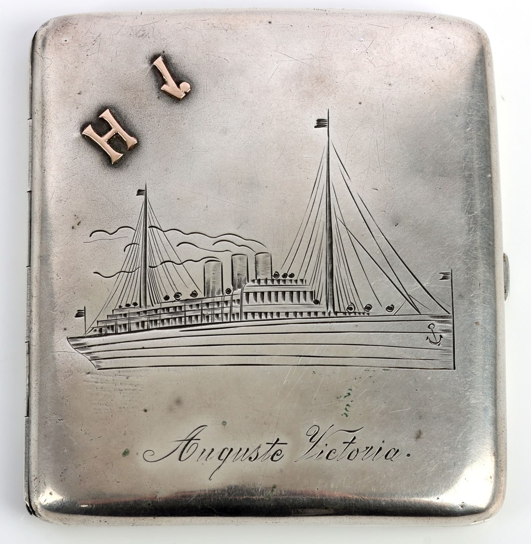800 AUGUSTE VICTORIA CREW SIGNED CIGARETTE CASE: Stamped .800 silver, vessel on outer case, engraved crew signatures on the inside. Gold monogram. 3 X 3 inches. German vessel, circa 1889.