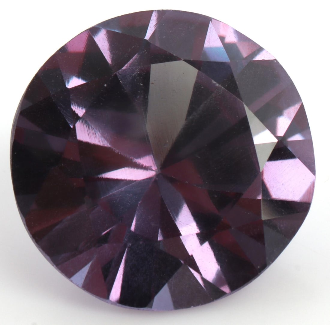 13 CARAT COLOR CHANGE SAPPHIRE: Measures approx 15.43mm X 8.7mm. Does not appear to have any scratches.
