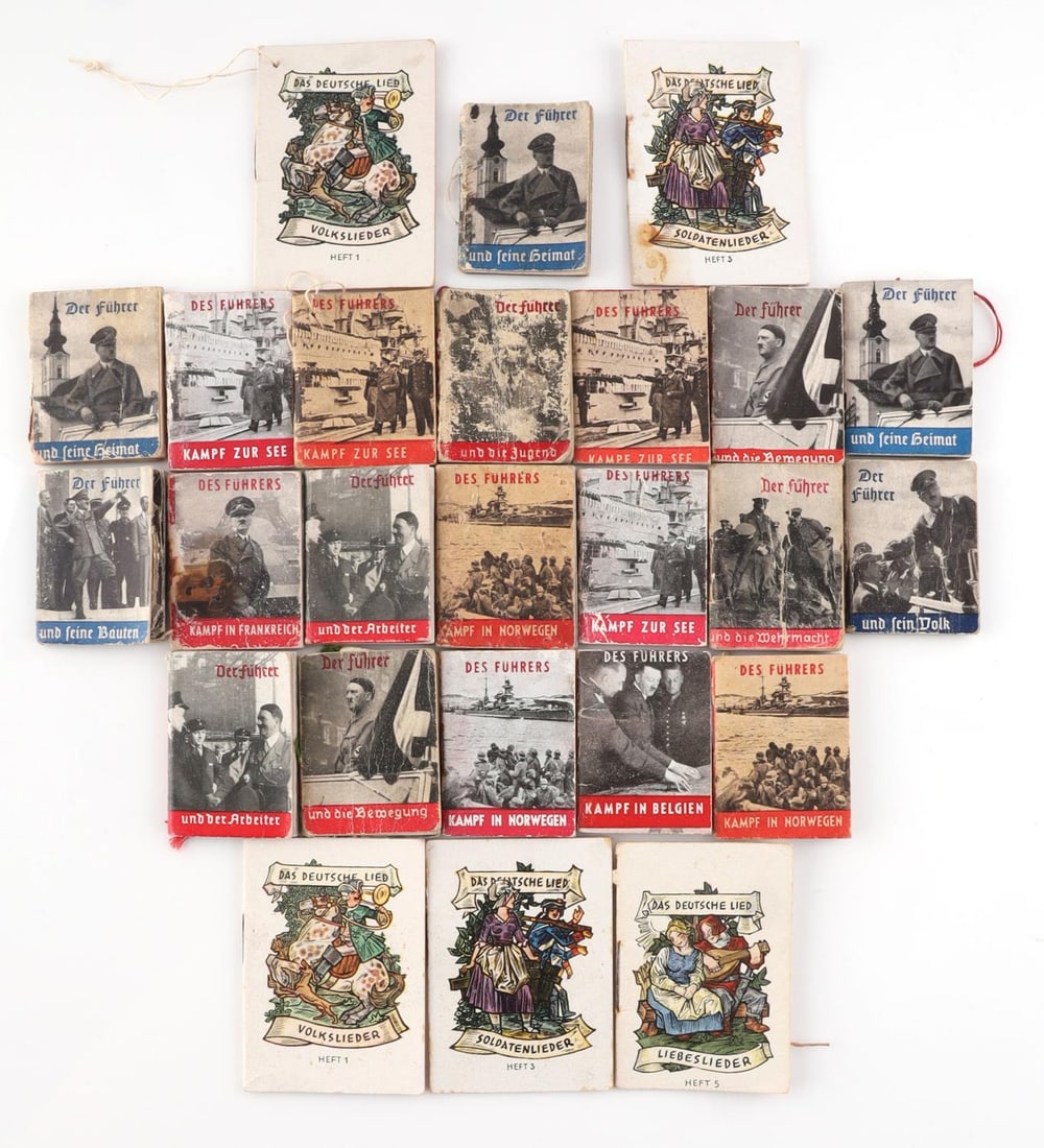 25 WWII GERMAN REICH WHW ADOLF HITLER MINI BOOKS: Lot of TWENTY-FIVE (25) WWII German Reich WHW(Winterhilfswerk) miniature books for Adolf Hitler(Der Furher) and information regarding the war. Book sizes approx. 1 1/2 inches by 2 inches and 2 inches 