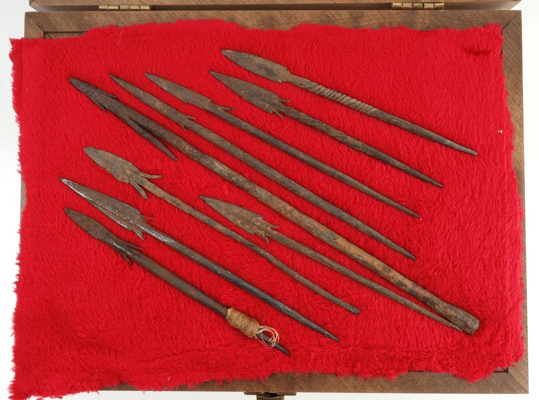 LOT 9 MEDIEVAL IRON ARROWHEADS IN STEELE'S DISPLAY: Lot of NINE (9) in a wood and glass Steele's display case. 12 X 9 X 3 inches. 6 to 11 inches. Presumed Medieval, perhaps Scythian.