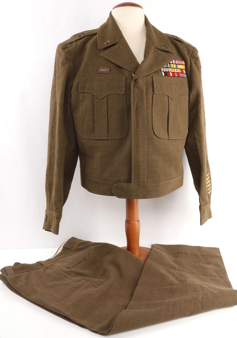 IKE JACKET OF BRIGADIER GENERAL GEORGE A. REHM: With trousers and ribbons, patches, stars are sterling. WWII General under MacArthur. Very good, original condition. Small size.