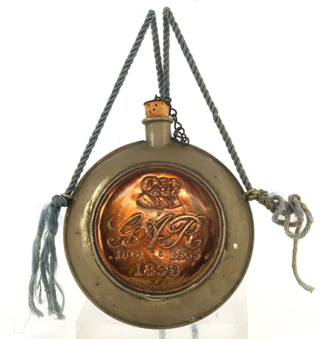 GRAND ARMY OF THE REPUBLIC SOUVENIR CANTEEN: Canteen for the Grand Army of the Republic, the Union veterans' organization after the Civil War. On one side, sports the likenesses of Sherman, Grant, and Sheridan and the embossment 'GAR 1861 to 186