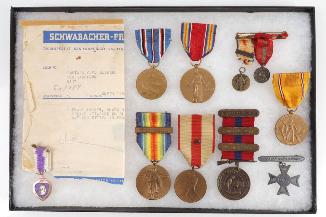 LOT OF 10 WWI - WWII USMC NAMED SERVICE MEDALS: Lot of TEN (10) WWI through WWII award medals presented to Lt. Col. Gustav F. Bloedel of the US Marine Corps (enlisted May 18, 1906). Includes personalized Marine Corps Good Conduct Medal with 2nd and