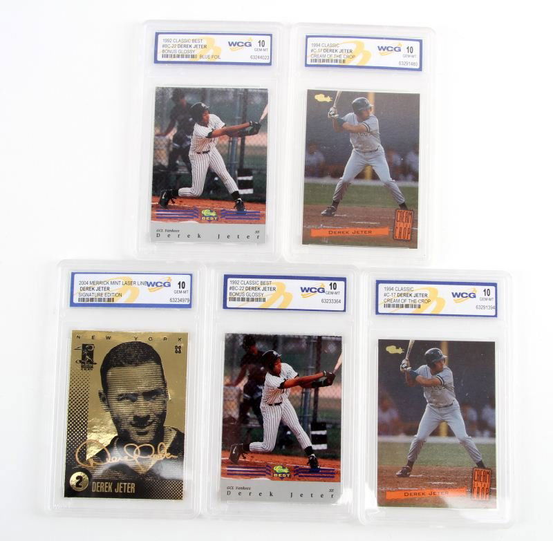 GRADED DEREK JETER 1992-2004 BASEBALL CARDS: This lot includes a 2004 Merrick Mint laser line Derek Jeter 23 karat gold card, two 1994 classic #c-17 Derek Jeter cream of the crop, two 1992 Classic Best #BC-22 Derek Jeter. All cards are graded by
