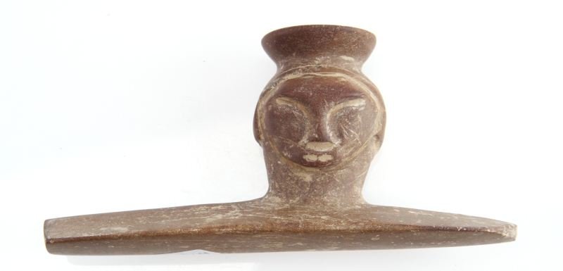 WOODLAND PERIOD NY PIPESTONE FACE EFFIGY PIPE: 6 inch single-side human effigy pipe, some plow nicks otherwise very good.