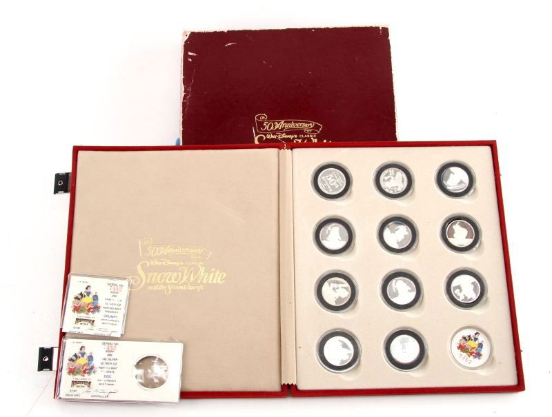 WALT DISNEY CO SNOW WHITE SILVER RARITIES SET 11: Set of eleven 0.5 OZT coins all with COA'S and original presentation case. US
