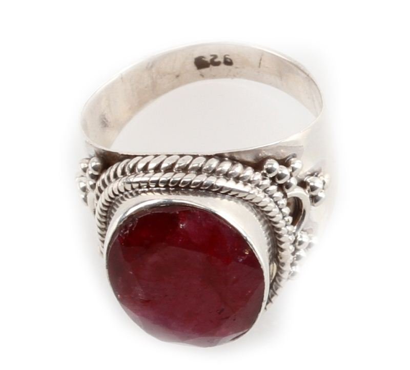 7 CT RUBY RING MOUNTED IN .925 STERLING SILVER: Silver filigree around ruby mount. Very clean. Size: 7 Weight: 6.17 Condition: good