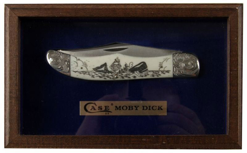 CASE MOBY DICK SCRIMSHAW COLLECTOR KNIFE W165 SAB: Case Cutlery Moby Dick commemorative scrimshaw bone handle knife, model number W165 SAB SSP. Limited edition in 5 by 8 inch glass presentation shadow box. Excellent condition, with COA sticker on back