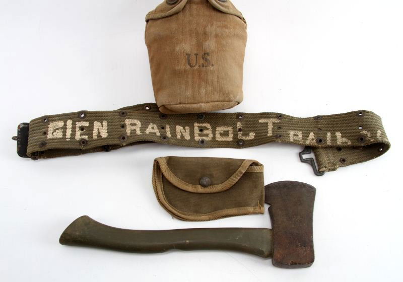 US ARMY WEB BELT CANTEEN AND HATCHET: Hatchet handle measures 13.5 inches tall from base to top of blade. Blade measures 5 by 3 by 1 inches. Includes web belt cover. Web belt has hand painted "GIEN RAINBOLT". Canteen is dated 1944 and inc