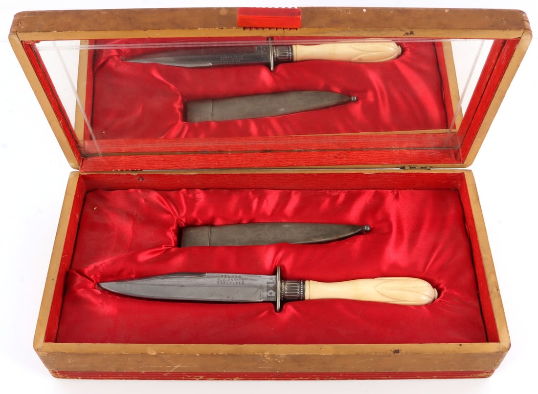 ANTIQUE IVORY HANDLED DAGGER BY WOSTENHOLM: Antique ivory gripper dagger. Stamped on ricasso 'I XL' stamped near back of blade 'George Wostenholm, Sheffield.' 6-inch blade. 5-inch handle. With metal scabbard and wood display box. Very good, ori