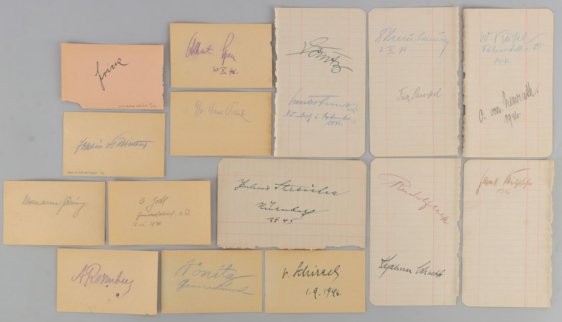 WWII GERMAN REICH NUREMBERG DEFENDANTS SIGNATURES: NINETEEN (19) total signatures, representing 18 of the 21 defendants at the Nuremberg War Crimes Tribunal. Individuals include Karl Doenitz, Albert Speer, Hans Frank, Alfred Jodl, Joachim Von Ribbentr