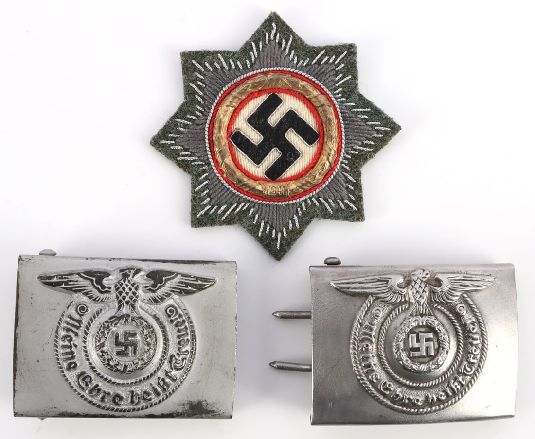 LOT OF 3 WWII GERMAN REICH BUCKLE & GERMAN CROSS: Lot of THREE (3). 1) Waffen-SS 'Mein Ehre Heist Treue' belt buckle. 3 X 2 inches. 2) Waffen-SS 'Meine Ehre Heist Treue' belt buckle. 3 X 2 inches. 3) German Cross in silver patch. Non-fluorescing. 3-i