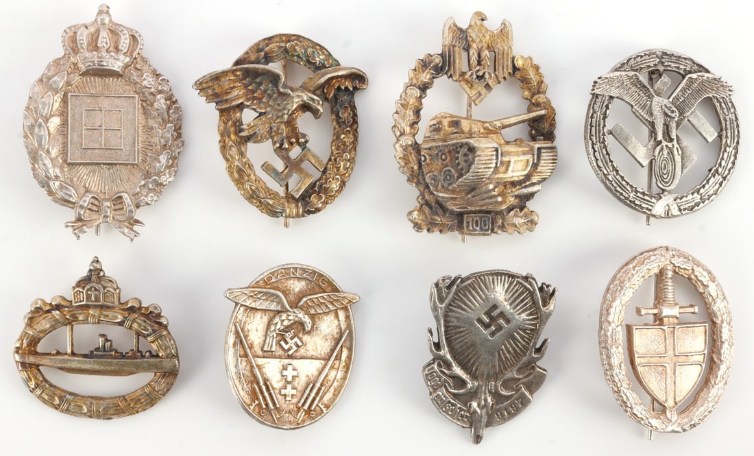 LOT OF 8 WWII GERMAN THIRD REICH BADGES & MEDALS: Lot of EIGHT (8). Luftwaffe Observer badge, Army Tank Assault badge (100 Assaults), Third Reich Hunting Society badge, WWI U-Boat badge, WWII Motor Sport badge, Danzig Flak badge, German Freikorps bad