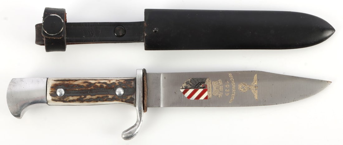 WWII GERMAN THIRD REICH PUMA RAD HUNTING DAGGER: Third Reich hunting dagger stamped by Puma. 8 inches overall, 4 5/8-inch blade. "Reichsparteitag 1935 Nurnberg" Marked on front. Antler grips. Very good condition. This lot has a reserve.