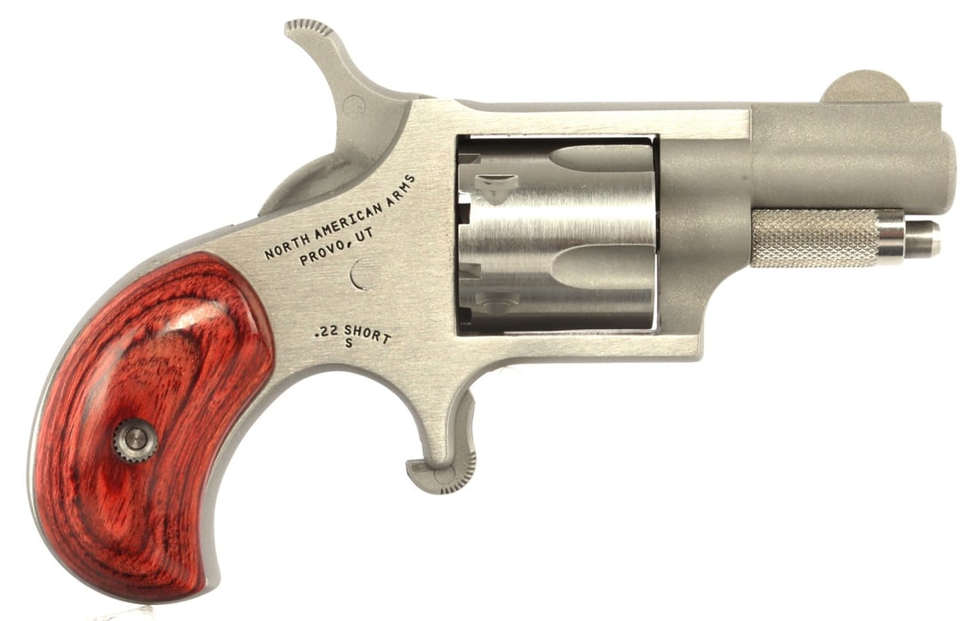 NORTH AMERICAN ARMS 22 SHORT SPUR TRIGGER REVOLVER: New in box North American Arms .22 Short single-action spur trigger revolver. 1-1/8 inch barrel. Model: S / NAA-22S. FFL required for transfer. No international shipping. Know your state's laws before