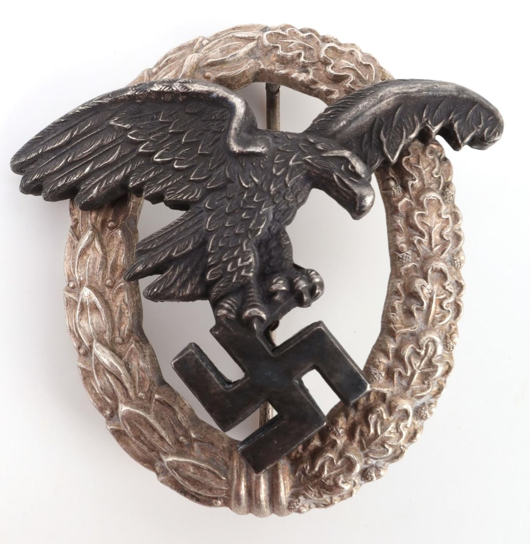 WWII GERMAN LUFTWAFFE OBSERVER BADGE: Assmann make. Multi-piece construction. Silvered finish. Measures 2 inches. Very good condition.
